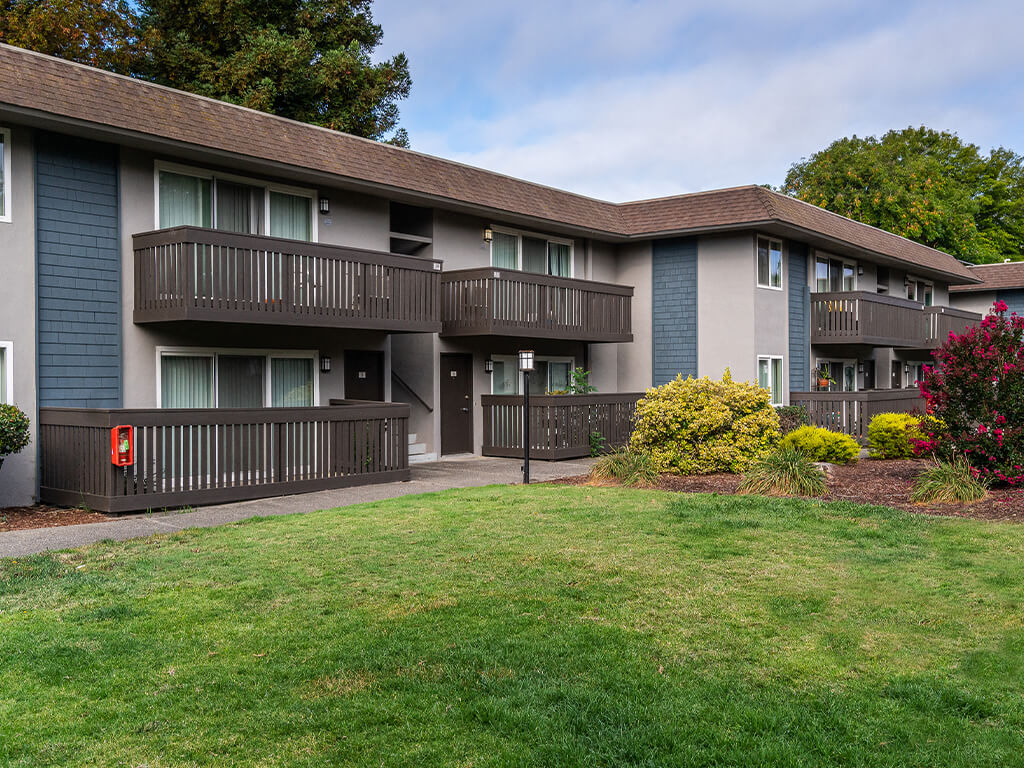 The building exterior and lawn at the Wyndover Apartment Homes in Novato, California.